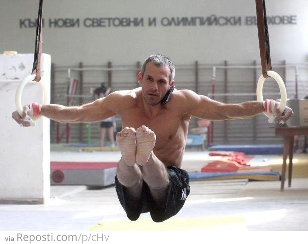 Olympic Gymnast Yordan Yovchev taking a phone call