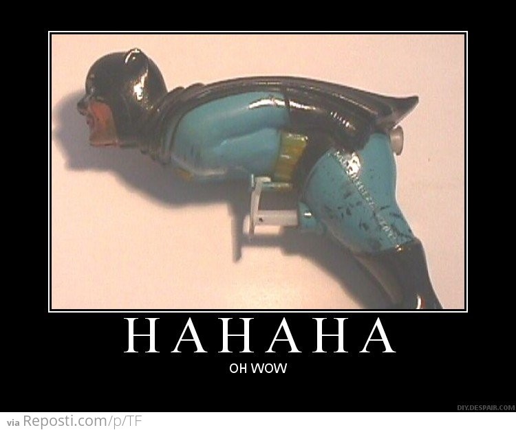 A batman water gun, the caption reads, "Ha Ha Ha - Oh Wow"