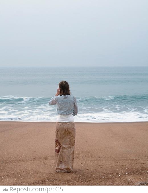 Girl wearing cute camo on the beach