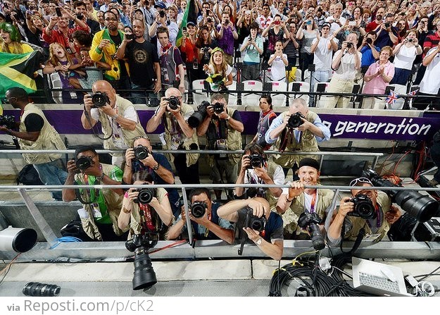 Usain Bolt borrowed a camera and took a picture of the crowd