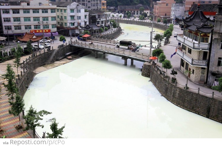 2km long section of the Quxi River in China is polluted by latex