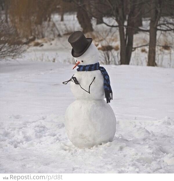 Snowman using an iPhone