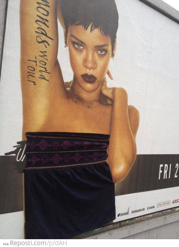 Someone is going around Dublin and stapling clothes to scantily-clad Rihanna