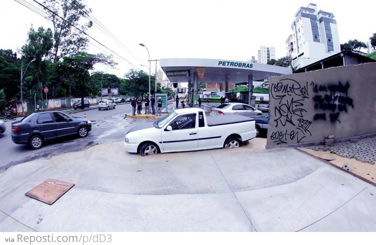 The owner refused to move it, so they built a sidewalk with an inlaid car