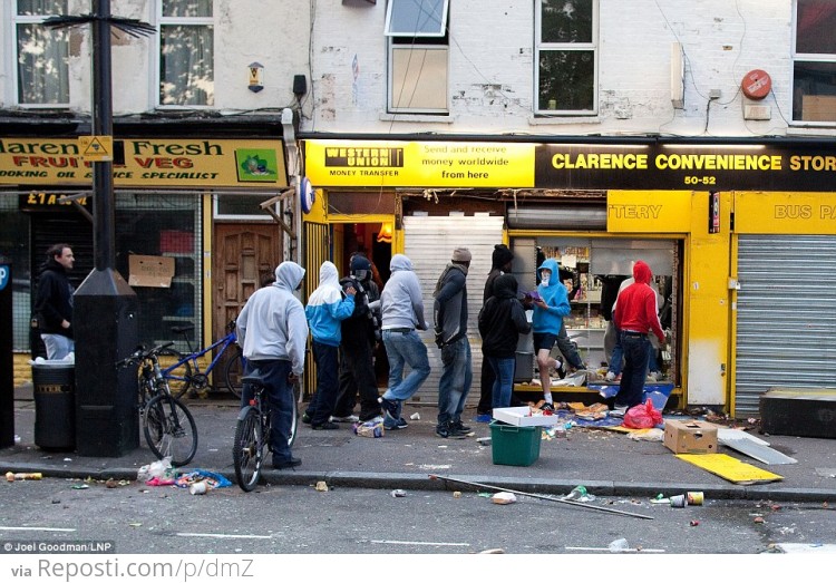 British People Queuing During The London Riots