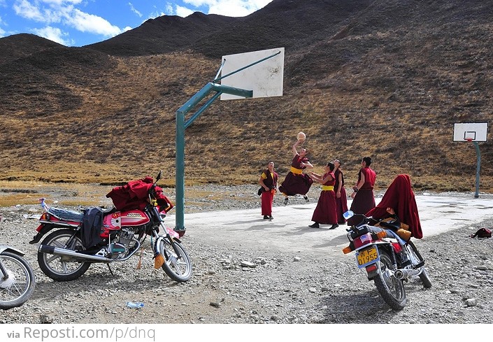 Buddhist Monks Playing Basketball