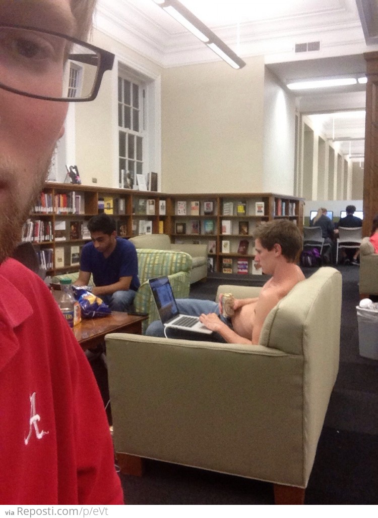 Studying for finals in the library, drinking beer and shirtless