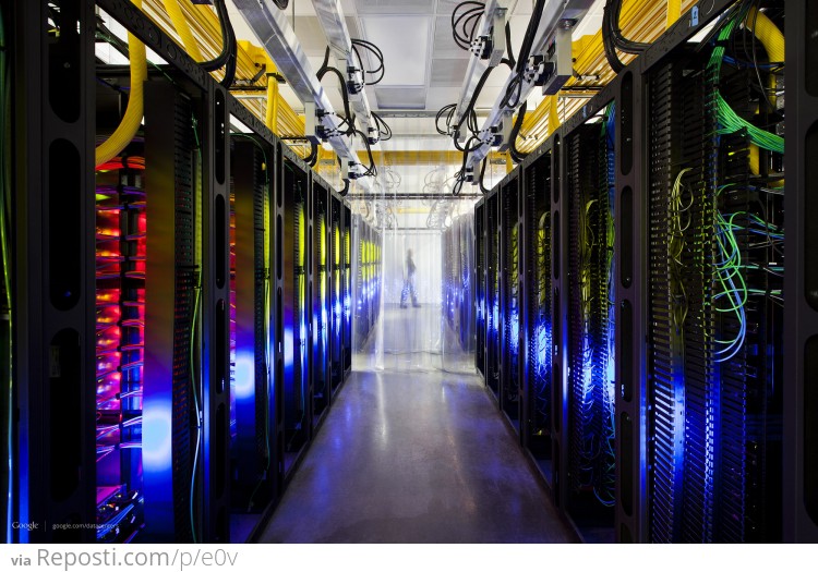 ###Google Data Center
Inside the campus network room, routers and switches allow our data centers to talk to each other. The fiber optic networks connecting the sites can run at speeds that are more than 200,000 times faster than a typical home Internet connection. The fiber cables run along the yellow cable trays near the ceiling.