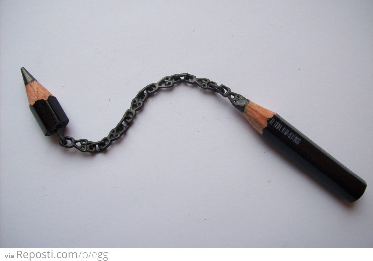 Chain carved from solid lead pencil