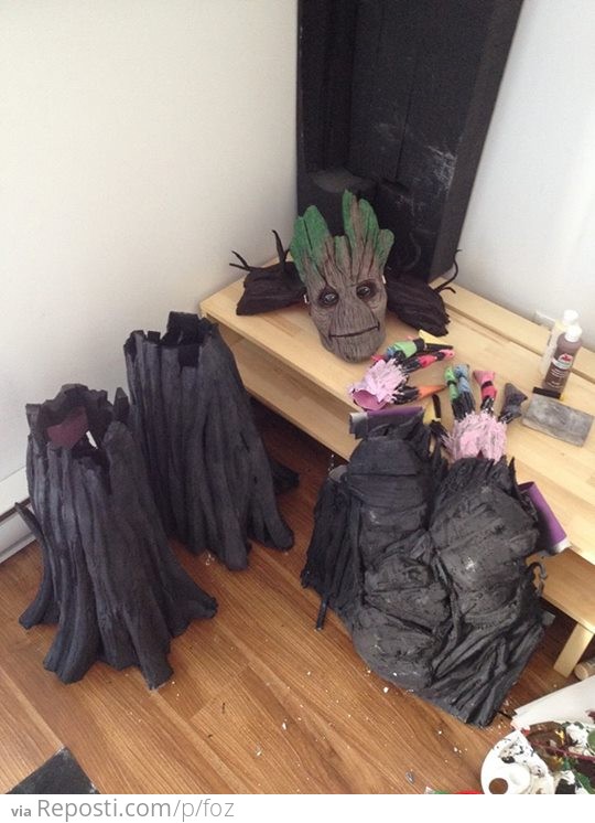 Spackle spread over all the foam, sanded, and then primed with black spray