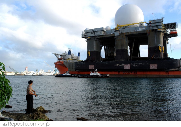 this is the SBX-1 - The Sea-Based X-Band Radar, which is a floating, self-propelled, mobile active electronically scanned array radar station designed to operate in high winds and heavy seas. It is part of the U.S. Defense Department Ballistic Missile Defense System.