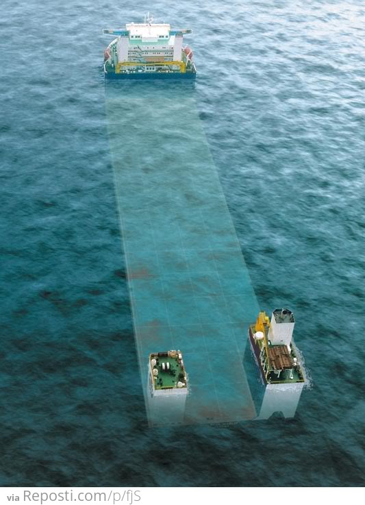 This is the Blue Marlin, a semi-submerging vessels capable of lifting another ship out of the water and transporting it.