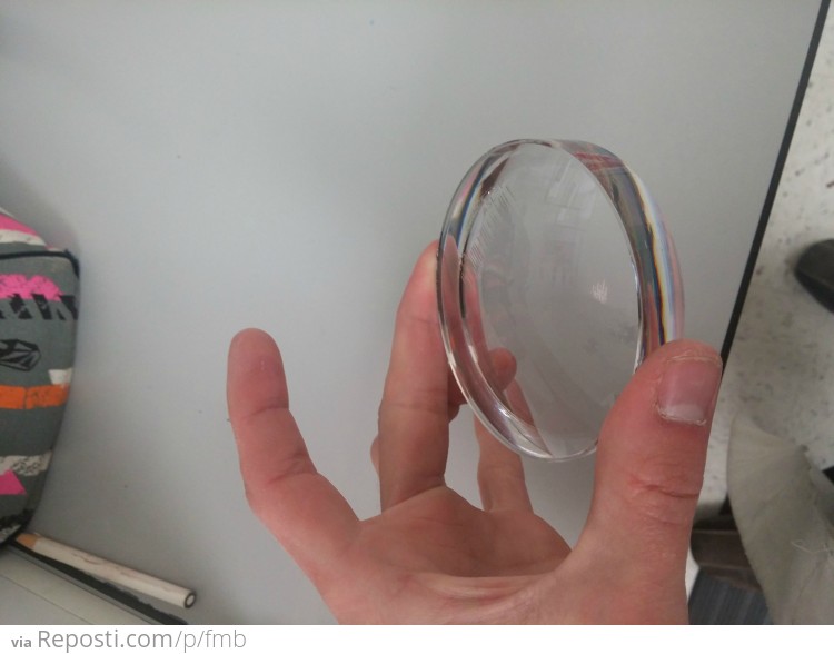 Voilà !!!!   The basic lens we start with is a lot like a hockey puck in size.
