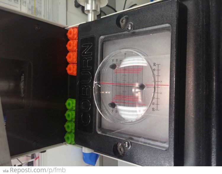 We set the lens on another type of blocking machine that looks a lot like the marker.