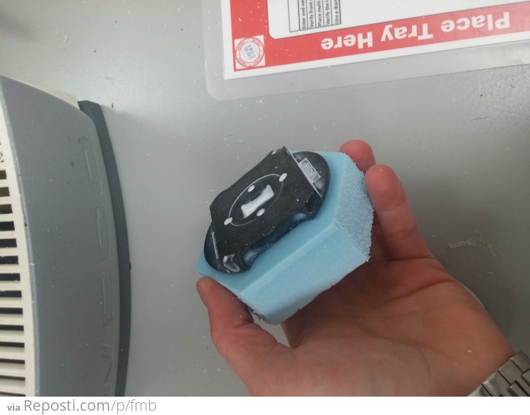 The black block with grooves is inserted into the foam.