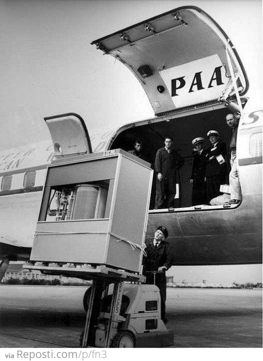 Uploading the first 5 megabyte hard disk to a PanAm plane, 1956