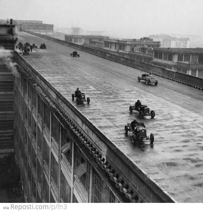 Factory workers race on the roof (test track) of the Fiat Factory in Turin, Italy, 1923