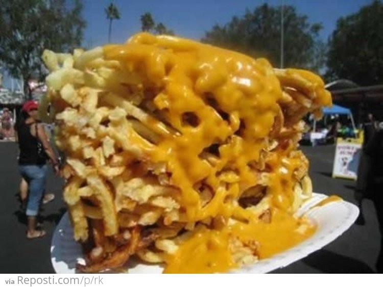 Huge Clump of Fries Covered In Cheese
