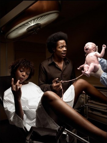 Woman And Man With Baby