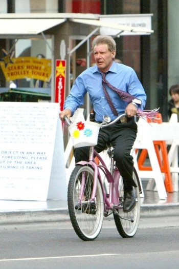 Harrison Ford Riding A Girl's Bike