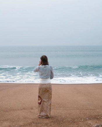 Girl wearing cute camo on the beach