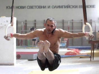 Olympic Gymnast Yordan Yovchev taking a phone call