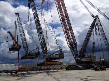 A crane lifting a crane lifting a crane lifting a crane