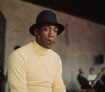 Young Bill Cosby smokin' a cigar