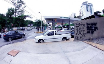 The owner refused to move it, so they built a sidewalk with an inlaid car