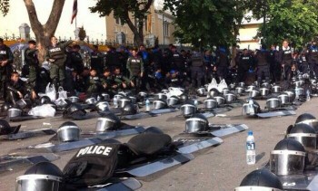 Thailand Police puts down weapons