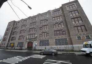 Former teacher who allegedly threatened mass shooting to sue bosses