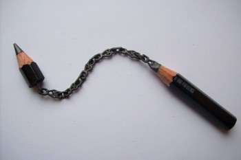 Chain carved from solid lead pencil
