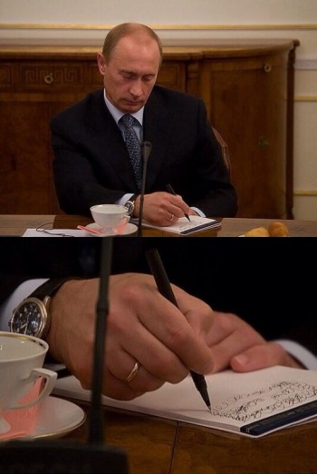 Putin taking notes while Obama was speaking