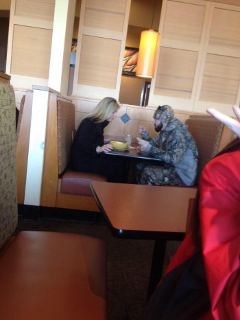 Woman eating alone