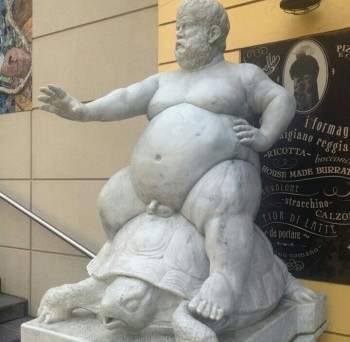 Naked Fat Guy Riding A Turtle