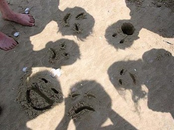 Faces In The Sand