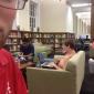 Studying for finals in the library, drinking beer and shirtless
